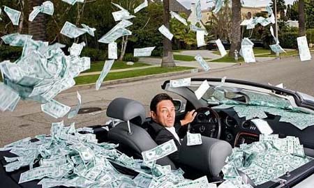 Jordan Belfort in a car with photshopped money floating around